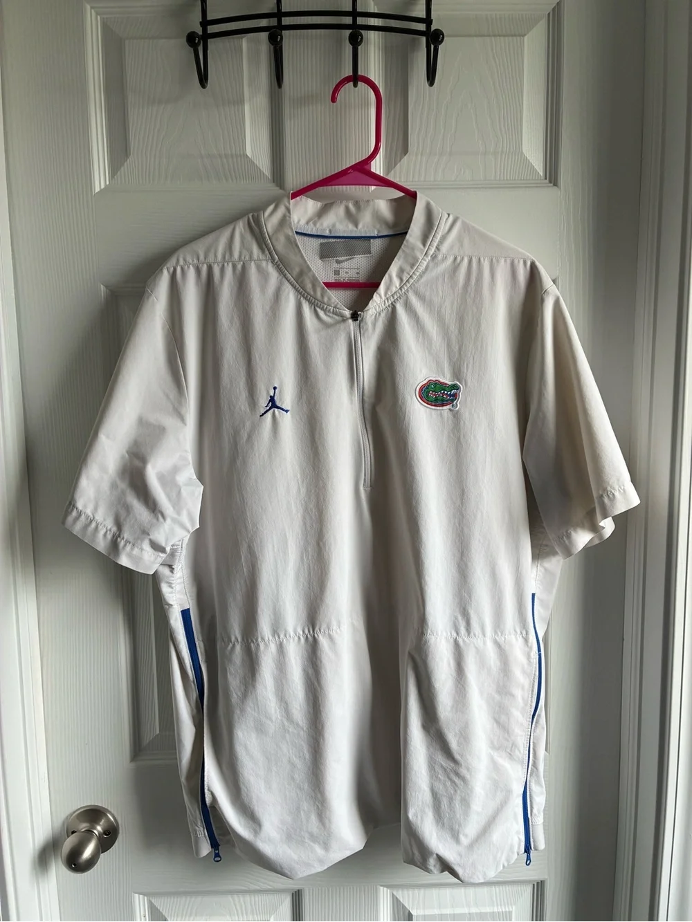 Jordan White Short-Sleeve Pullover with Blue Accents and Team Patch